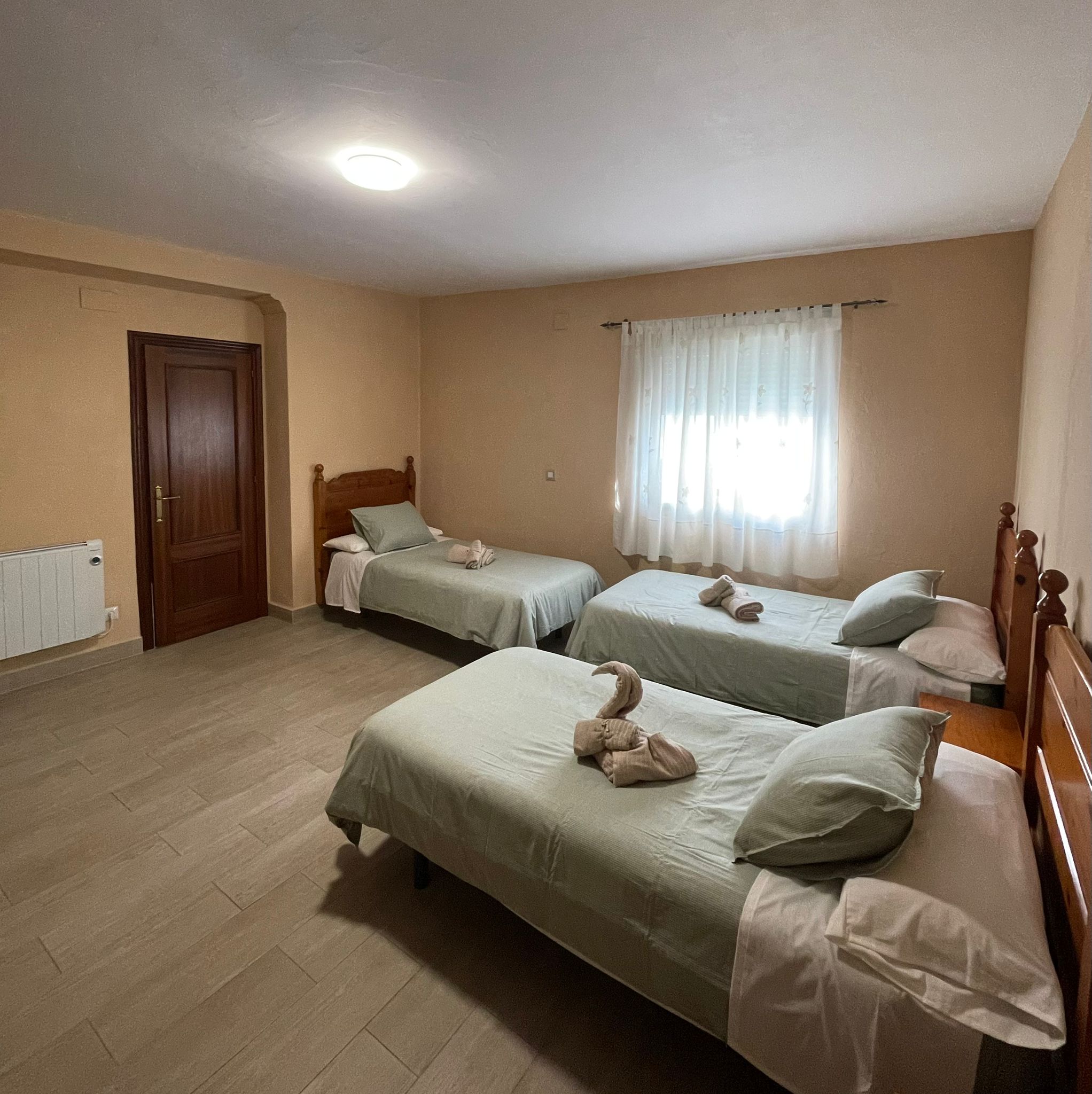 Dormitorio principal de 3 camas Dormitorio principal de 3 camas